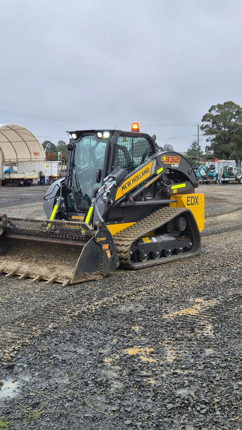 EDX New Holland tracked skid steer